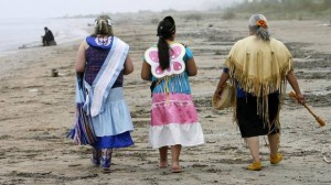 Charlotte Showne Olivia Cloud, and Catheryn Mandocka, left to right, who participated in ceremonies walk on Ipperwash beach after the signing the transfer agreement for Ipperwash Provincial Park to be transferred to the Chippewas of Kettle and Stony Point First Nation, on May 28, 2009, at Ipperwash, near Forest, Ont. (DAVE CHIDLEY/The Canadian Press)
