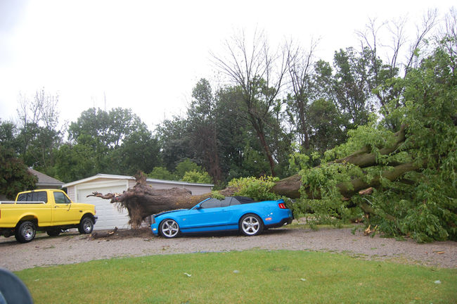 Trees and power lines came down near Grand Bend as a severe storm moved through Lambton Shores on July 27, 2014. Damage to one property is shown in this file photo taken right after the storm. While much of the cleanup has been carried out, some signs of the storm still remain in the community. (File photo/Postmedia Network)