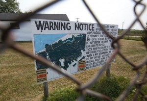 A sign warns visitors to the former army camp at the Chippewas of Kettle and Stony Point First Nation of unexploded ordnance in parts of the 2,400 acre site in Ipperwash. (Free Press file photo)