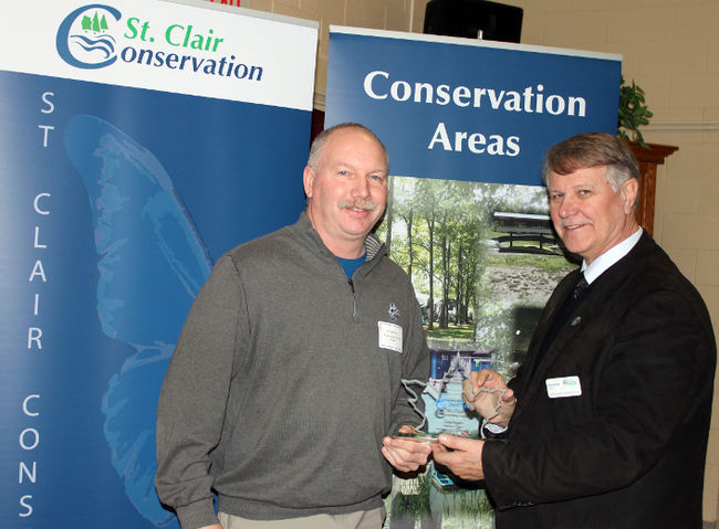 Doug Rogers (left) of Lambton Shores was formally recognized by the St. Clair Region Conservation Authority for his land stewardship work. He’s shown with St. Clair Township Mayor Steve Arnold, who was returned as chair of the conservation authority at Thursday’s annual general meeting in Strathroy. Also formally recognized for their conservation efforts were John and Mary-Ellen King of Warwick Township. (HANDOUT/ SARNIA OBSERVER/ POSTMEDIA NETWORK)