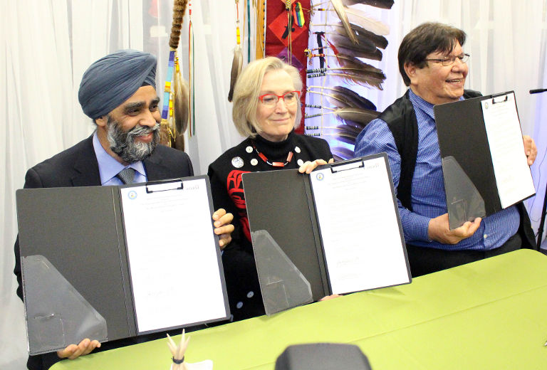 Minister of National Defence Harjit Sajjan, Minister of Indigenous and Northern Affairs Dr. Carolyn Bennett and Kettle and Stony Point Chief Tom Bressette